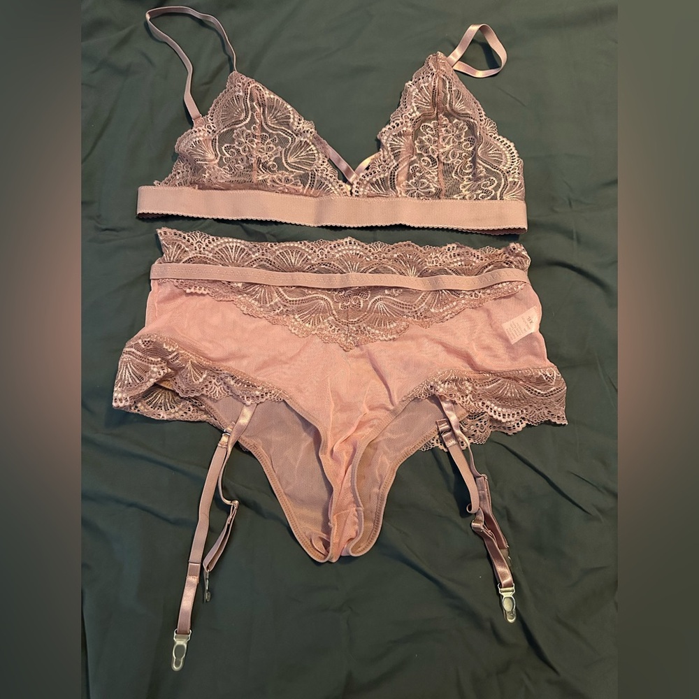 Selling 4 pieces of lingerie. Blue outfit is 1X & other 3 pieces are 2XL  NWOT